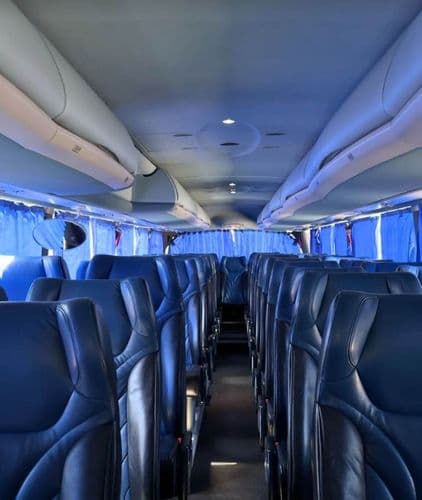 Світлий та комфортний салон автобуса BTA BUS із сучасними пасажирськими сидіннями для тривалих міжнародних поїздок.