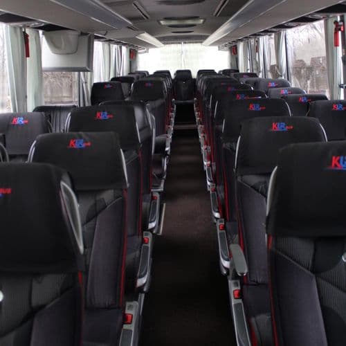 Салон автобуса KLR Bus з сучасним обладнанням для комфортних міжнародних перевезень